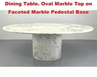 Lot 10 Italian style Marble Pedestal Dining Table. Oval Marble Top on Faceted Marble Pedestal Base