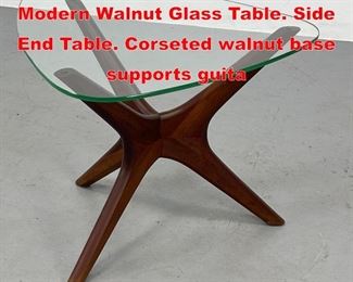 Lot 96 ADRIAN PEARSALL Amer. Modern Walnut Glass Table. Side End Table. Corseted walnut base supports guita
