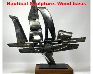 Lot 111 Brutalist Torch Cut Steel Nautical Sculpture. Wood base.