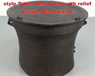Lot 112 Southeast Asian Rain Drum style Table. Resin form with relief design. Black finish. 