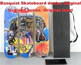 Lot 116 Skateroom, JeanMichel Basquiat Skateboard decks. Original bag and hooks. Original label
