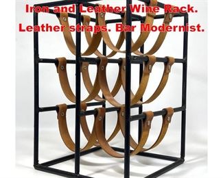 Lot 159 ARTHUR UMANOFF Black Iron and Leather Wine Rack. Leather straps. Bar Modernist.
