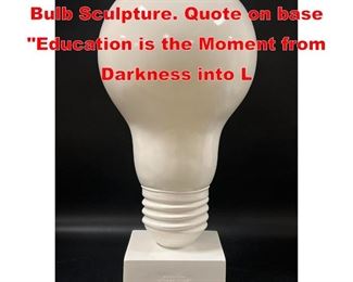 Lot 168 TMS Inc Modernist Light Bulb Sculpture. Quote on base Education is the Moment from Darkness into L