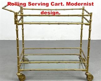 Lot 231 Gilt Metal Faux Bamboo Rolling Serving Cart. Modernist design.