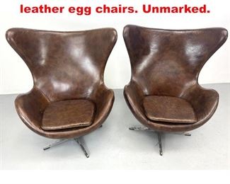Lot 258 Pair Contemporary brown leather egg chairs. Unmarked. 