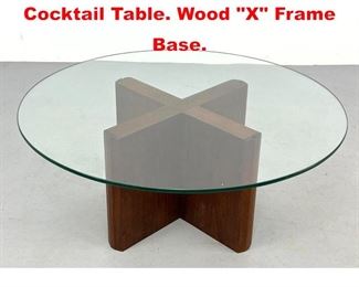 Lot 259 Round Glass Top Modernist Cocktail Table. Wood X Frame Base. 