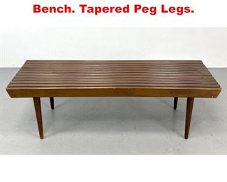 Lot 339 Modernist Wood Slat Bench. Tapered Peg Legs. 