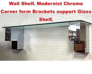 Lot 374 Chrome Cityscape style Wall Shelf. Modernist Chrome Corner form Brackets support Glass Shelf. 