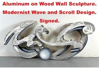 Lot 428 DEAN JOHNSON Brushed Aluminum on Wood Wall Sculpture. Modernist Wave and Scroll Design. Signed. 