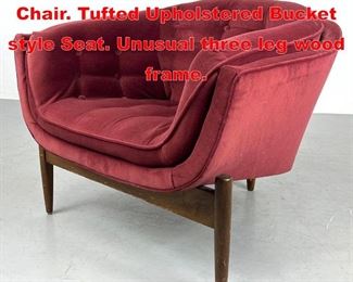 Lot 476 Stylish Modernist Lounge Chair. Tufted Upholstered Bucket style Seat. Unusual three leg wood frame. 