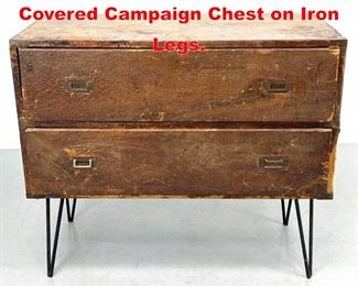 Lot 498 Heavily Distress Leather Covered Campaign Chest on Iron Legs. 