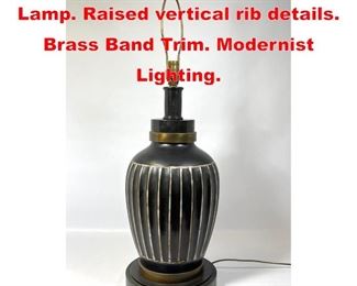 Lot 513 Black glazed Pottery Table Lamp. Raised vertical rib details. Brass Band Trim. Modernist Lighting. 