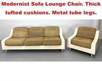 Lot 535 2pc Molded Fiberglass Modernist Sofa Lounge Chair. Thick tufted cushions. Metal tube legs.