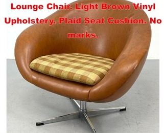 Lot 538 Overman style Swivel Lounge Chair. Light Brown Vinyl Upholstery. Plaid Seat Cushion. No marks. 