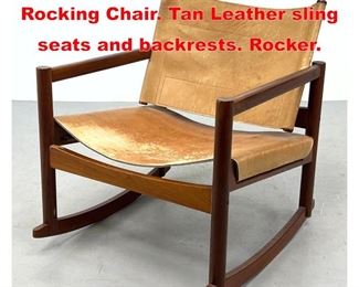 Lot 548 Modernist Wood Frame Rocking Chair. Tan Leather sling seats and backrests. Rocker. 
