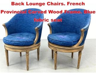 Lot 564 Pr Swivel Graduated Barrel Back Lounge Chairs. French Provincial Carved Wood Frame. Blue fabric seat