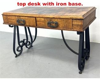Lot 574 Italian Style Oak Parquet top desk with iron base. 