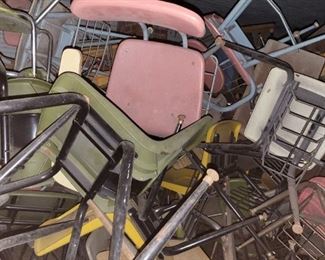 room full of school chairs, sold by the room