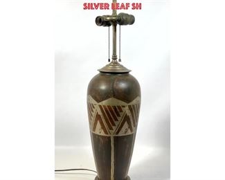 Lot 760 French Art Deco Mixed Metal Table Lamp. Decorative Band with stylized feather design. Silver leaf sh