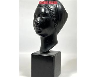 Lot 778 Mid Century Modern Portrait Bust Sculpture. Young Woman with Head Wrap. Black cube Base
