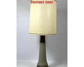 Lot 829 Gordon Martz Studio Pottery Table Lamp. Tall lamp with incised lines. Original finial. Pottery only 