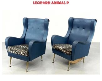Lot 925 Pr Italian Modern Lounge Chairs. Wing Back style. Blue upholstered frames with faux leopard animal p