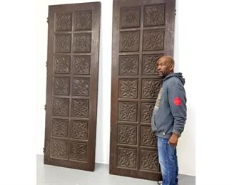 Lot 1114 Pair of large Mid century Carved Wood Doors