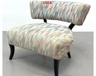 Lot 1125 Modernist Upholstered Lounge Chair. Low Profile Bowed Backrest. Dark Stained wood legs. 