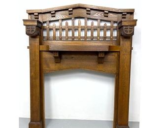 Lot 1218 Arts and Crafts Oak Fire Place surround with Gothic heraldic influence