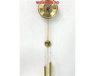 Lot 1327 Howard Miller Lucite wall time and strike brass and for Howard Miller, ca 1970, Clock was working fo