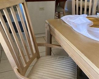 Very nice breakfast table and chairs... has 2 more leaves. and matching bar stools in kitchen
