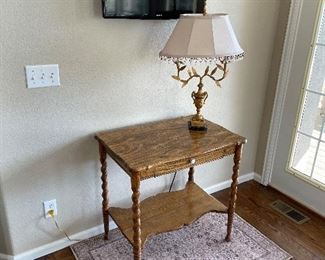 Antique table 
Lamp
TV
Rug