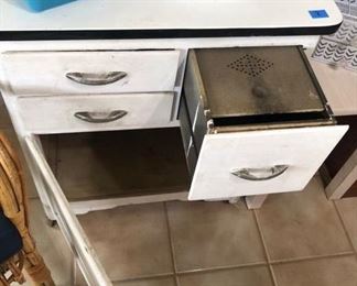 has tin flour bin drawer