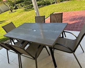 Patio Table with 6 Chairs (1 year old)