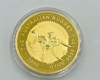 Large selection of gold and palladium coins.