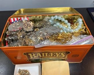 Baileys Tin Full of Items To Repurpose