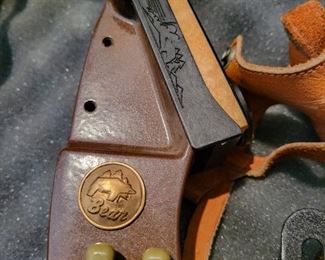 Bear compound bow with arrows