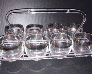 Set of 8 roly poly silver rim glasses with caddy