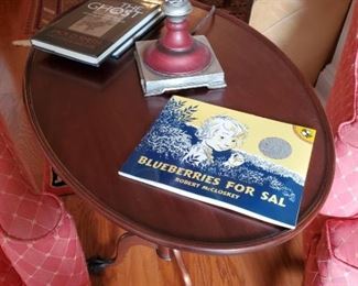 Oval table with claw feet