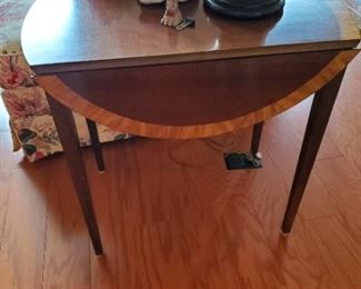 Two pictures.  The trim on this table shines in the sun.