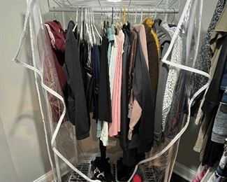 Women's clothing - size small to medium. (4) total clothing racks!