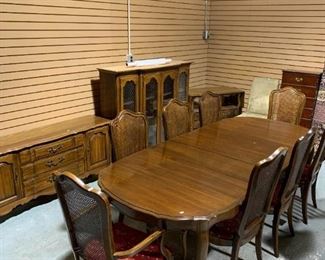 Thomasville French Provincial dining table with 3 leaves, 8 chairs and 2 piece china cabinet. (server is sold)