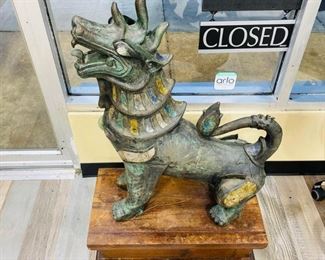 $7199 Pair of Antique Bronze Thai Foo Dog Statues Jade Amethyst Rose Quartz For inquiries about the listing or if you are selling your gold or silver, please text or call 7032689529 or visit the Tysons Jewelry Store at 8373 Leesburg Pike #12, Vienna Virginia 22182 This pair of antique 20th century 1900 bronze life size Tony Duquette style Thai foo dog statues encrusted with jade amethyst rose quartz on the ears, neck, chest and legs shown are available for local pickup.
Statue Dimensions:
Height: 35 in (88.9 cm)
Width: 28 in (71.12 cm)
Depth: 12 in (30.48 cm)
Wood Pedestal Dimensions:
Height: 8.5 in (21.59)
Width 13.5 in (34.29)
Depth 12 in (30.48 cm)