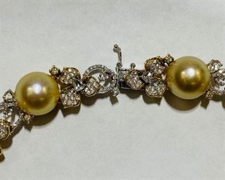 $9500 All Real Authentic Two Tone 18K Yellow White Gold 100 Grams 5 Carat SIG Color CI Quality Diamonds 13 Piece 13mm Genuine South Sea Golden Pearls Necklace For inquiries about the listing or if you are selling your gold or silver, please text or call 7032689529 or visit the Tysons Jewelry Store at 8373 Leesburg Pike #12, Vienna Virginia 22182