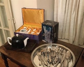 Tea sets. Flatware. Crystal vase.