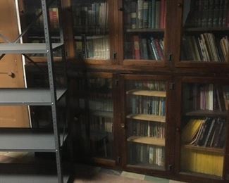 Books and vintage bookcases with “wavy glass” sliding doors!