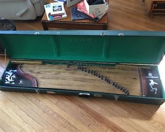 Zither Zheng (or "Guzheng") is a traditional Chinese string instrument with more than 2500 years of history.