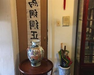 Vintage antique table and Oriental vase.