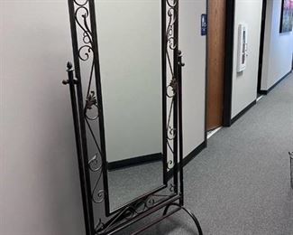 Iron framed swivel mirror 78 x 35 x 17 in
