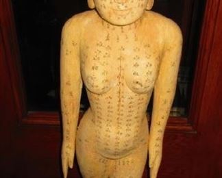 Carved wood Asian goddess statue 